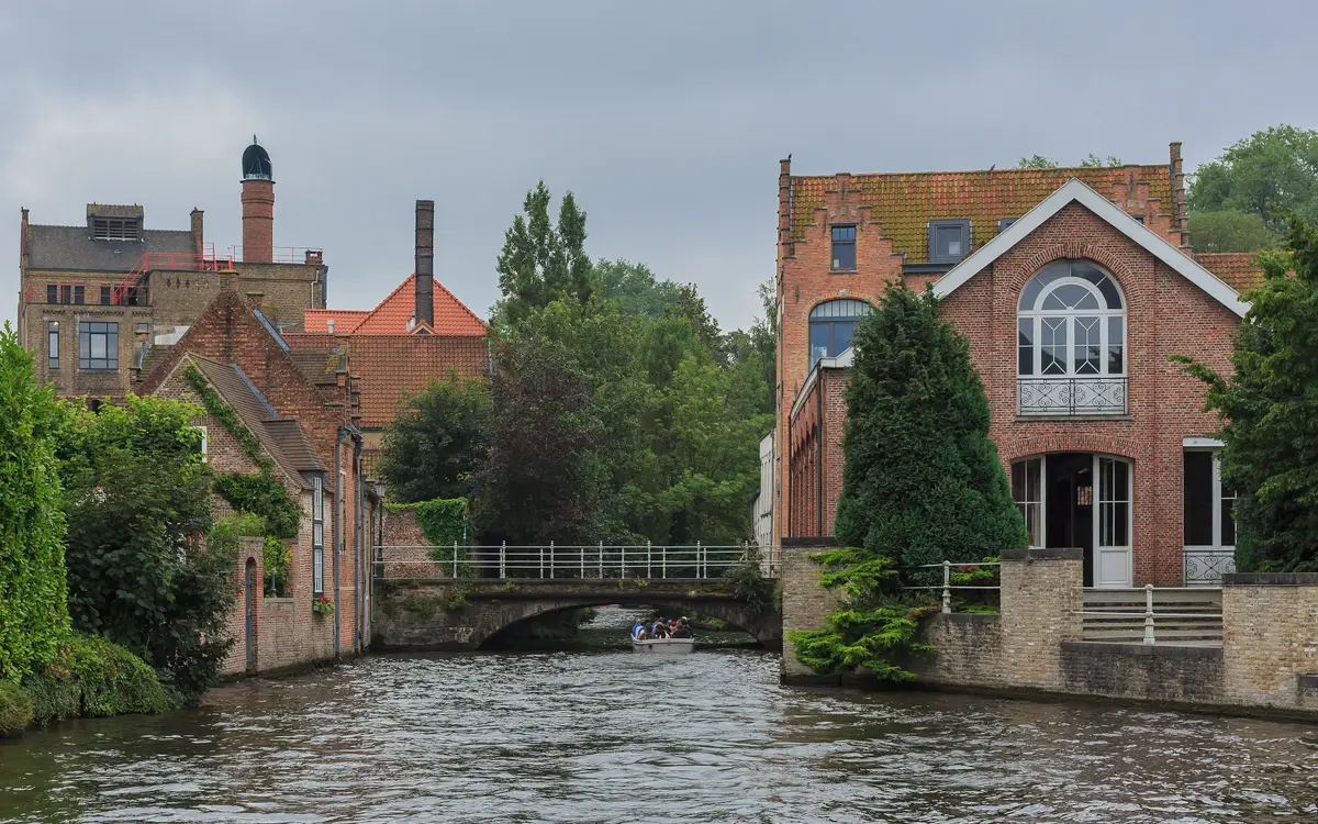 Web design in Belgium: Bruges, Belgium: Bakkersrei Canal with The Haalve Maan Brewery in the background