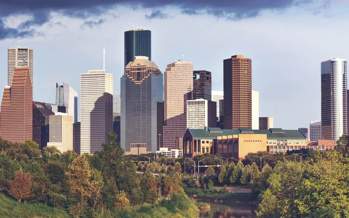 Web design in Houston: Skyline of the Houston, TX downtown district. The photo was taken from the west, over Buffalo Bayou.