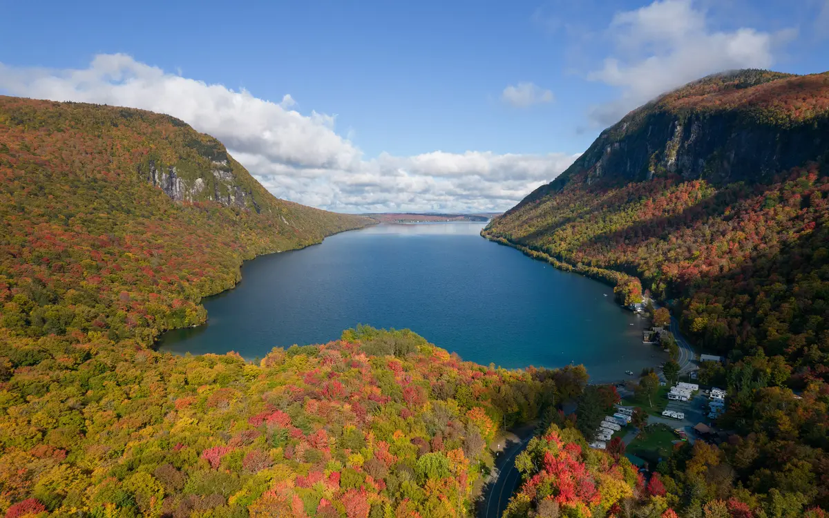 Web design in Vermont: Drone view of Lake Willoughby, Vermont, with Mount Hor on the left and Mount Pisgah on the right.